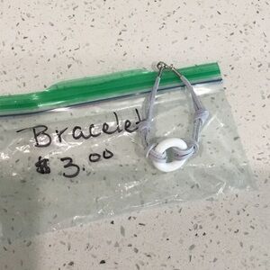 White Plastic Link Bracelet with Light Gray Cord or White with Black Cord